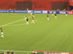 The U.S. warming up before the match. Twenty years from now in footage from the tournament Nike's ridiculous neon-and-black uniforms are going to look super-dated.